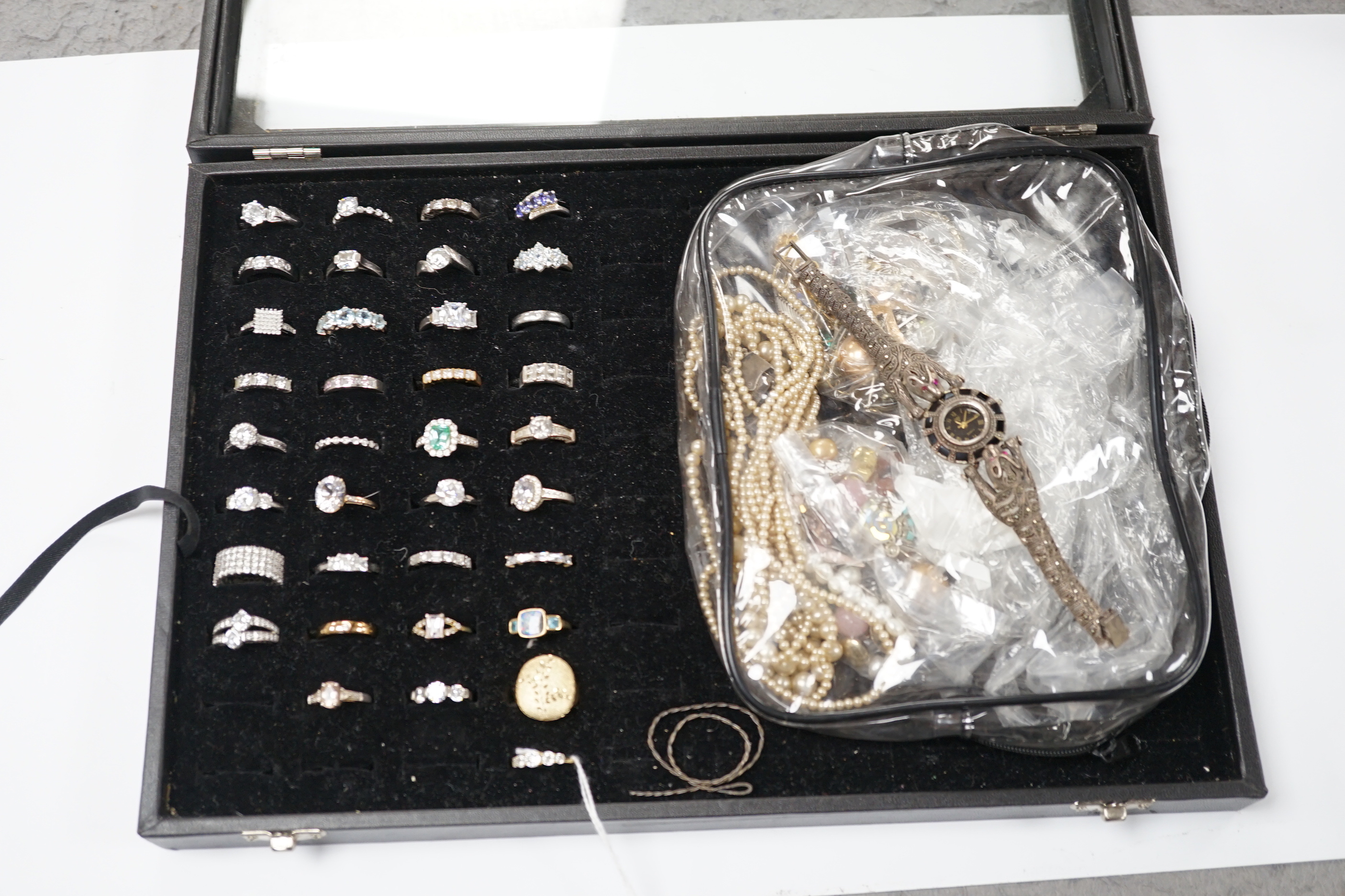 A collection of assorted paste set dress rings and sundry costume jewellery